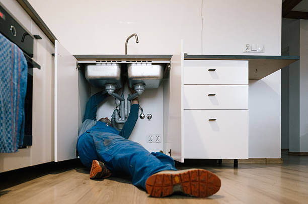 Professional Emergency Plumber technician working in Louisa, VA